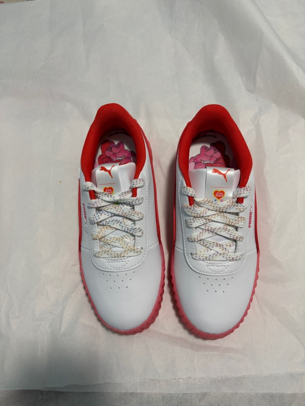Puma Kids White Sneakers with Red Trim and Pink Insole